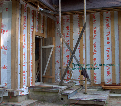 Фото облицовки дома панелями Kombitherm