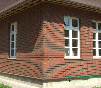 Фото облицовки дома панелями Kombitherm