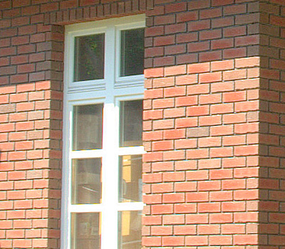 Фото облицовки дома панелями Kombitherm